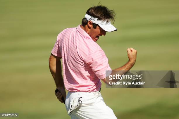 Trevor Immelman of South Africa reacts after making birdie on the 18th hole during the final round of the Stanford St. Jude Championship at TPC...