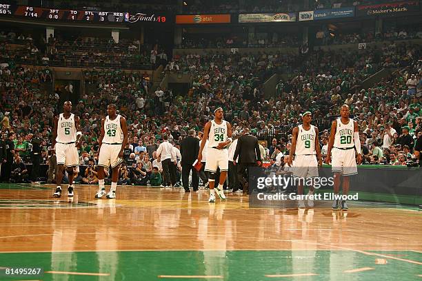 Kevin Garnett, Kendrick Perkins, Paul Pierce, Rajon Rondo, and Ray Allen of the Boston Celtics walks off the bench against the Los Angeles Lakers...