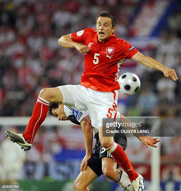 Polish midfielder Dariusz Dudka vies with German midfielder Michael Ballack during their Euro 2008 Championships Group B football match Germany vs....