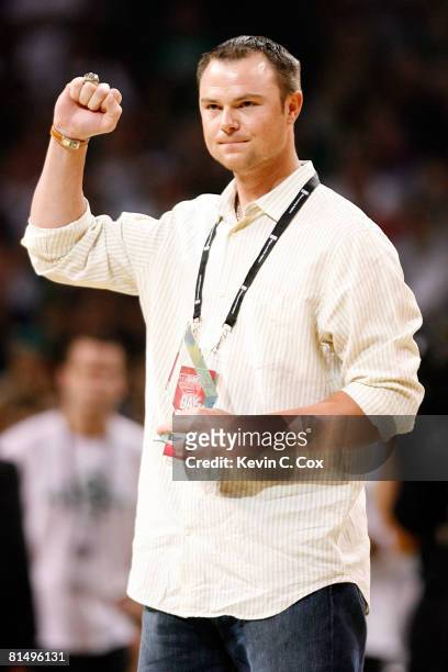 Boston Red Sox pitcher Jon Lester is introduced during a break in the game between the Los Angeles Lakers and the Boston Celtics in Game Two of the...