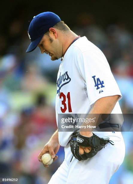 Pitcher Brad Penny of the Los Angeles Dodgers reacts after giving up three runs in the 5th inning during the game at Dodger Stadium on June 8, 2008...