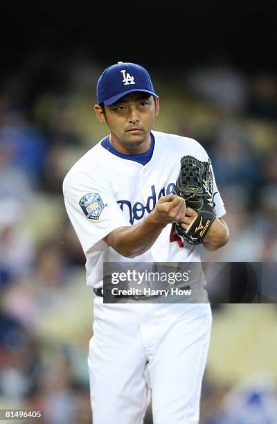 Takashi Saito of the Los Angeles Dodgers appeals to first base umpire in the ninth inning during the game against the Chicago Cubs at Dodger Stadium...