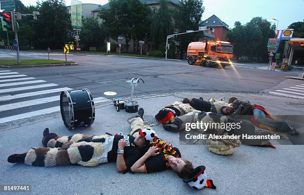 German football supporters sleep on a street in downtown Klagenfurt on June 9, 2008 in Klagenfurt, Austria. Germany beat Poland 2-0 in their EURO...