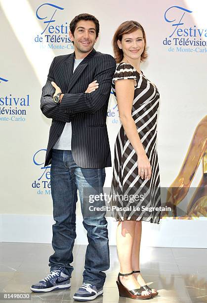 Actor Mathieu Delarive attends a photocall promoting the television series "Cellule d'Identite" and actress Aurelie Bargeme promotes the television...