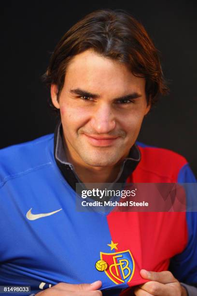 Roger Federer of Switzerland wearing a FC Basle football shirt on day six of the Masters Series at the Monte Carlo Country Club, April 24, 2008 in...