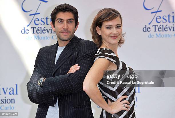 Actor Mathieu Delarive attends a photocall promoting the television series "Cellule d'Identite" and actress Aurelie Bargeme promotes the television...