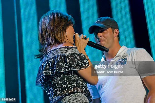 Sara Evans sings to her new fiance, Jay Barker at The 2008 CMA Music Festival on June 8, 2008 at the LP Field in Nashville, Tennessee.