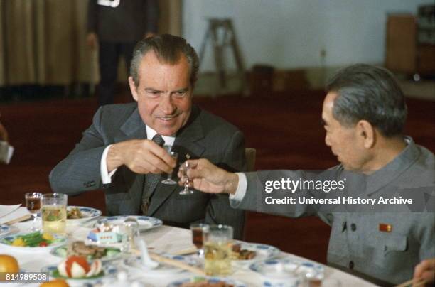 President Richard Nixon and Chinese Premier Zhou Enlai toast, February 25, 1972 during Nixon's visit to Communist China.