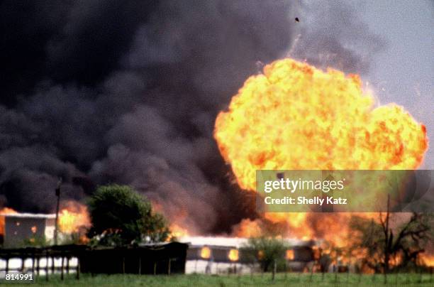 The Branch Davidian compound explodes into a burst of flames ending the standoff of David Koresh & his followers at this site near Waco, Texas April...