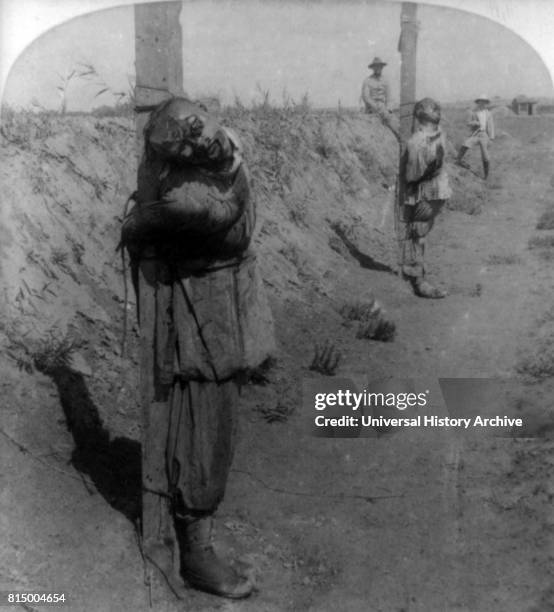 Chinese Boxer prisoners executed at Tientsin, China during the suppression of the Boxer Rebellion 1901.