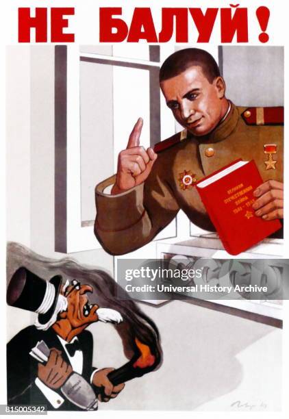 Soviet Russian propaganda poster delivering a warning to the USA not to meddle with atomic weapons. The beginning of the Cold War is represented in...