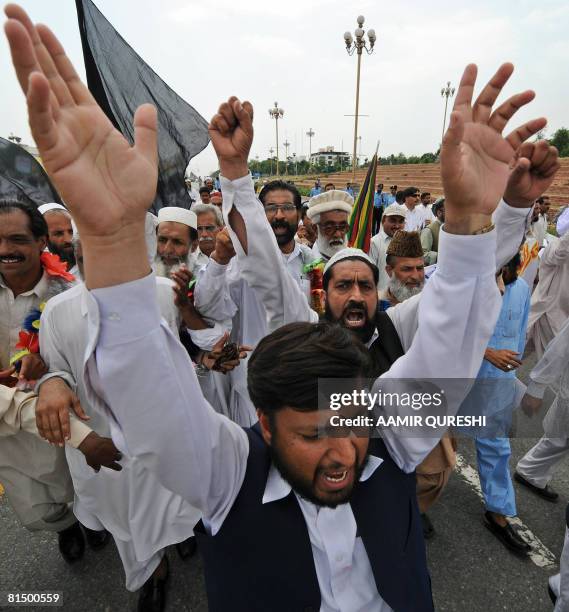 Pakistani government schools teachers shout slogans during a demonstration in front of the Parliament House in Islamabad on June 9, 2008 to protest...