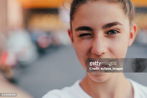teenager girl make selfie and making grimaces - cute 15 year old girls stock pictures, royalty-free photos & images