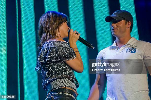 Sara Evans sings to her new fiance, Jay Barker at The 2008 CMA Music Festival on June 8, 2008 at the LP Field in Nashville, Tennessee.