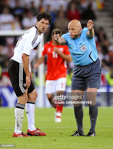 Assistant referee Norwegian Geir Age gestures towards German midfielder Michael Ballack during their Euro 2008 Championships Group B football match...
