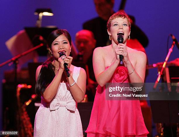 Emy Coligado and Emily Bergl perform at the 6th annual 'What a Pair' concert at the Orpheum Theatre on June 8, 2008 in Los Angeles, California.