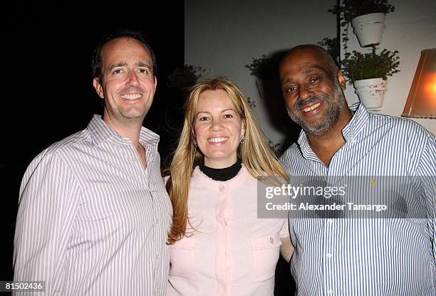 Chip Brady, Allison Brady and Danny Simmons pose at the Rush Philanthropic Arts Foundation VIP reception at the Delano Hotel on April 4, 2008 in...