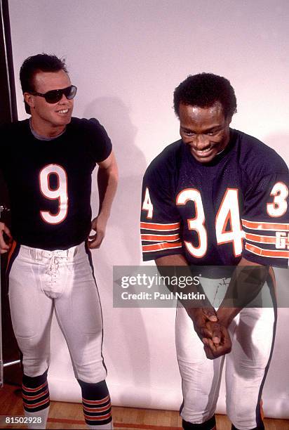 Chicago Bears quarterback Jim McMahon and Hall of Fame running back Walter Payton during filming of the Super Bowl Shuffle in Chicago, Illinois in...