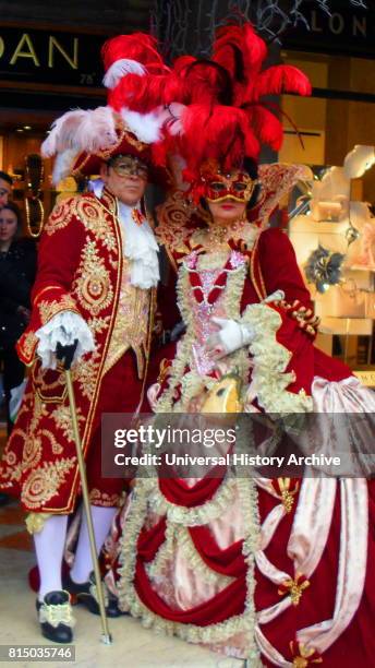 Costumed attendees at the Venice Carnival , an annual festival held in Venice, Italy. Started to recall a victory of the 'Serenissima Repubblica'...