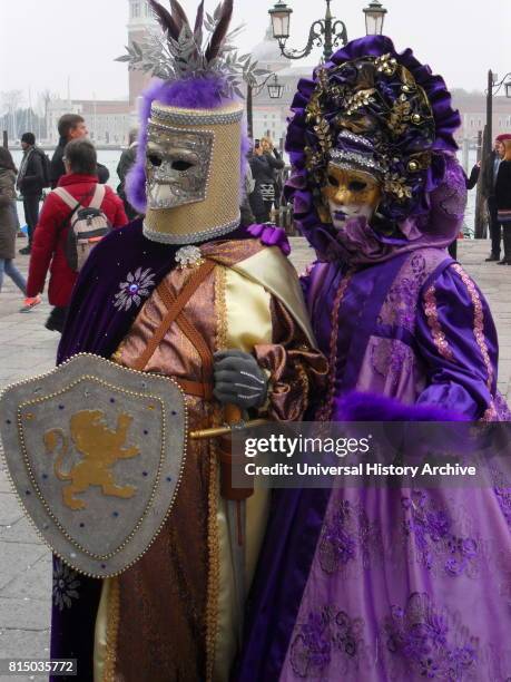 Costumed attendees at the Venice Carnival , an annual festival held in Venice, Italy. Started to recall a victory of the 'Serenissima Repubblica'...