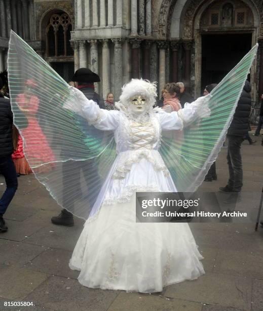 Costumed attendee at the Venice Carnival , an annual festival held in Venice, Italy. Started to recall a victory of the 'Serenissima Repubblica'...