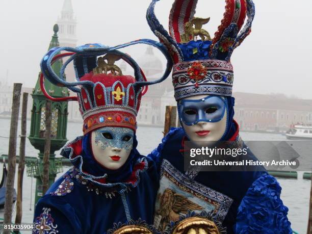 Costumed attendees at the Venice Carnival , an annual festival held in Venice, Italy. Started to recall a victory of the 'Serenissima Repubblica'...