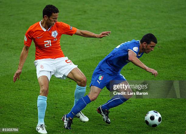 Antonio Di Natale of Italy runs for the ball with Khalid Boulahrouz of Netherlands during the Euro 2008 Group C match between Netherlands and Italy...