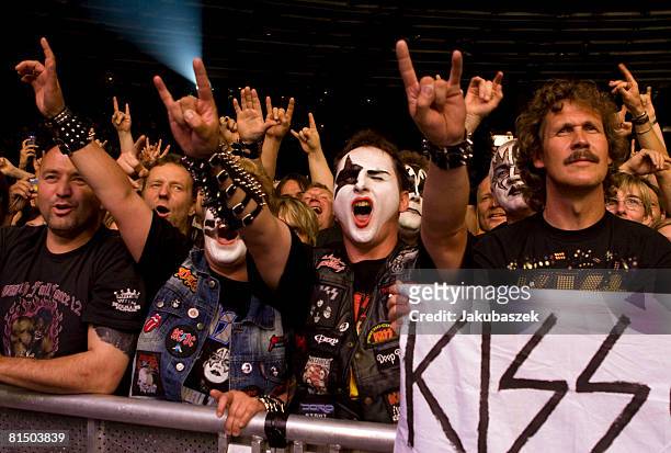 Fans cheer while the US-American Hard-Rock-Band KISS performs live during a concert at the Velodrom on June 9, 2008 in Berlin, Germany. The concert...