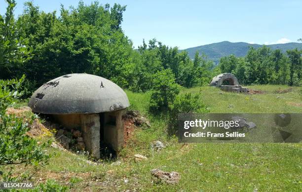 bunkers in the albanian landscape - cold war stock pictures, royalty-free photos & images