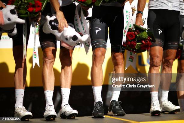 Team Sky pose for a photo on the podium for leading the team classification during stage 14 of the 2017 Le Tour de France, a 181.5km stage from...