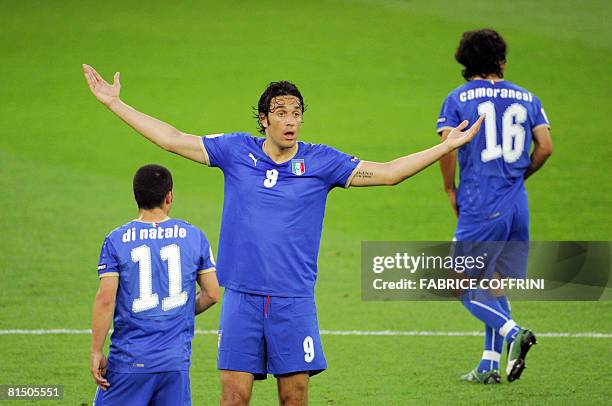 Italian forward Antonio Di Natale, Italian forward Luca Toni and Italian midfielder Mauro Camoranesi react during their Euro 2008 Championships Group...