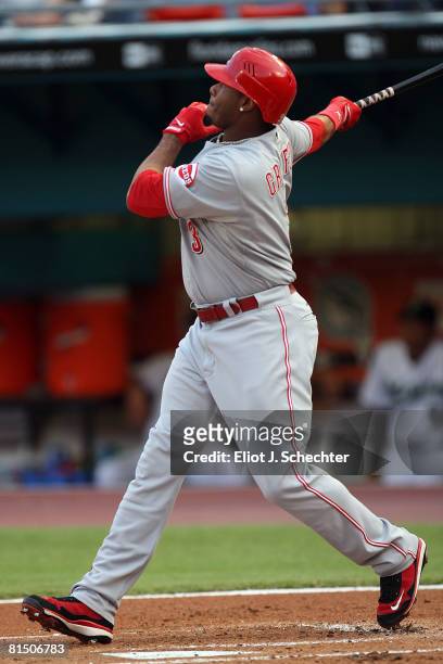 Ken Griffey Jr. #3 of the Cincinnati Reds hits his 600th career home run against the Florida Marlins in the first inning on June 9, 2008 at Dolphin...