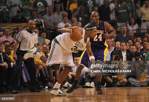 Paul Pierce of the Boston Celtics drives past Kobe Bryant of the Los Angeles Lakers during Game 2 of the NBA finals at the TD Banknorth Garden in...