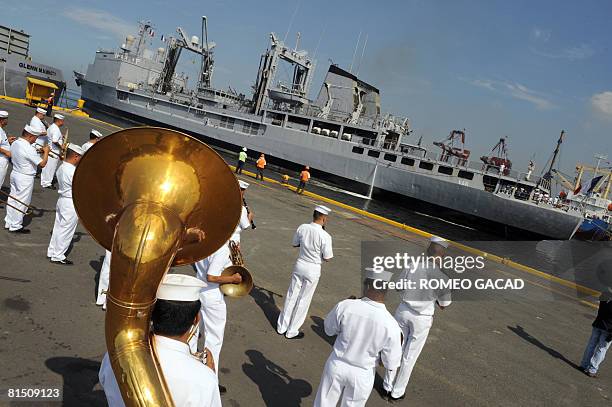 Philippine Navy band welcomes the French flagship FNS Var on its arrival at Manila port on June 10, 2008. The ship carrying Vice Admiral Gerard...