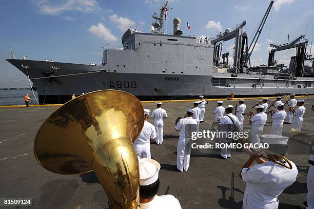 Philippine Navy band welcomes the French flagship FNS Var on its arrival at Manila port on June 10, 2008. The ship carrying Vice Admiral Gerard...