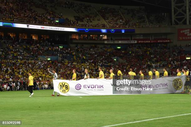 Players of Borussia Dortmund applaud fans after the preseason friendly match between Urawa Red Diamonds and Borussia Dortmund at Saitama Stadium on...