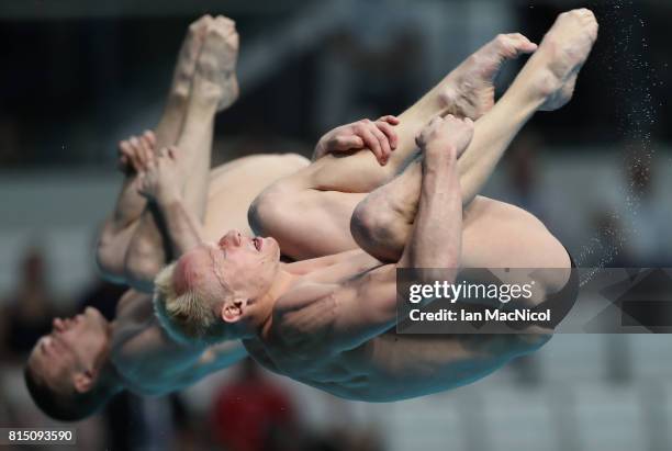 Evgenil Kuznetsov and Ilia Zakharov of Russia compete in the final of the Men's 3m Synchro Springboard during day two of The FINA World Championships...