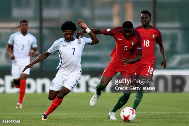Isaac Buckley-Ricketts of England in action with Abdu Conte of Portugal during the UEFA European Under-19 Championship Final between England and...