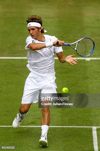 Daniel Evans of Great Britain in action during his match against Xavier Malisse of Beligium on Day 2 of the Artois Championships at Queen's Club on...