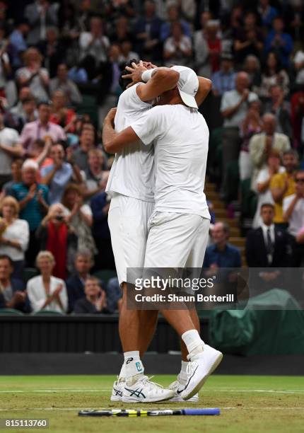 Marcelo Melo of Brazil and Lukasz Kubot of Poland celebrate victory during the Gentlemen's Doubles final against Oliver Marach of Austria and Mate...