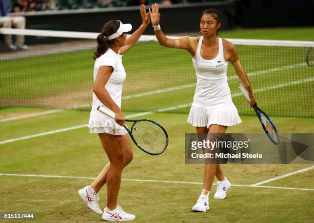 Monica Niculescu of Romania and Hao-Ching Chan of Chinese Taipei celebrate in the Ladies Doubles Final against Ekaterina Makarova and Elena Vesnina...