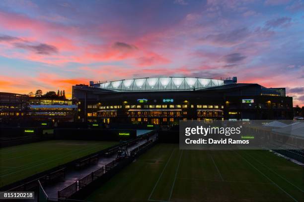 General view of the Centre Court as the sun sets on day twelve of the Wimbledon Lawn Tennis Championships at the All England Lawn Tennis and Croquet...