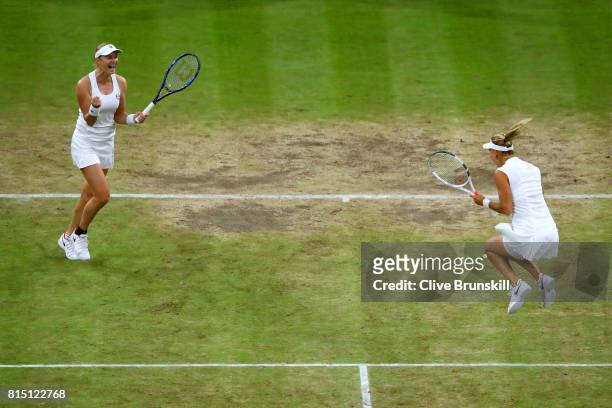 Ekaterina Makarova and Elena Vesnina of Russia celebrate victory in the Ladies Doubles Final against Hao-Ching Chan of Chinese Taipei and Monica...