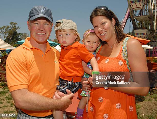 Actors Neal McDonough and Ruve Robertson with children at the A Time for Heroes Celebrity Carnival Sponsored by Disney benefiting the Elizabeth...