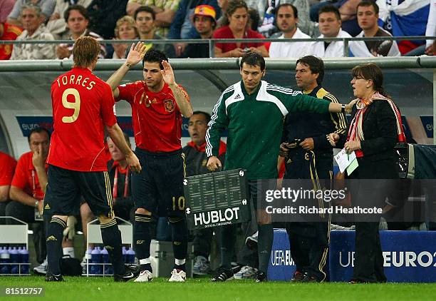 Fernando Torres of Spain is substituted for Cesc Fabregas of Spain during the UEFA EURO 2008 Group D match between Spain and Russia at Stadion Tivoli...