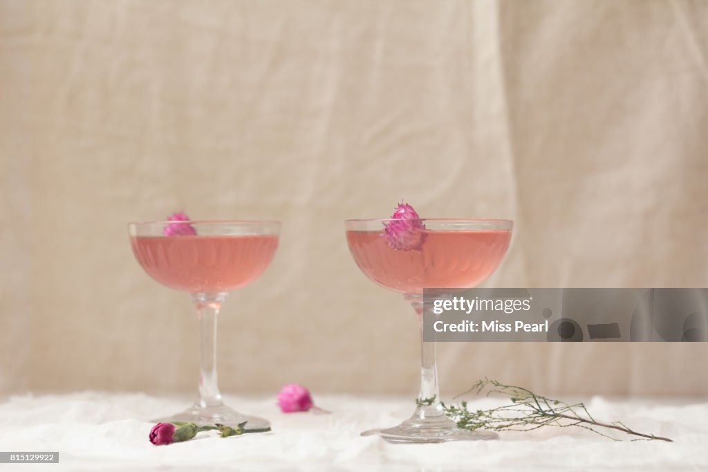 Pretty pink party drinks with flowers