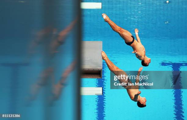 Stephen Feck and Patrick Hausding of Germany compete in the final of the Men's 3m Synchro Springboard during day two of The FINA World Championships...