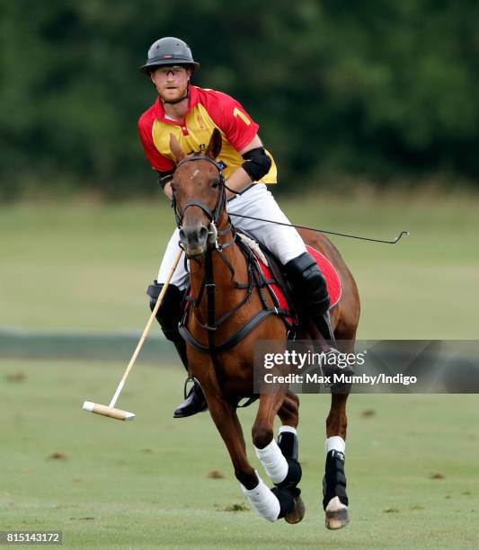 Prince Harry plays in the Jerudong Park Trophy charity polo match at Cirencester Park Polo Club on July 15, 2017 in Cirencester, England.