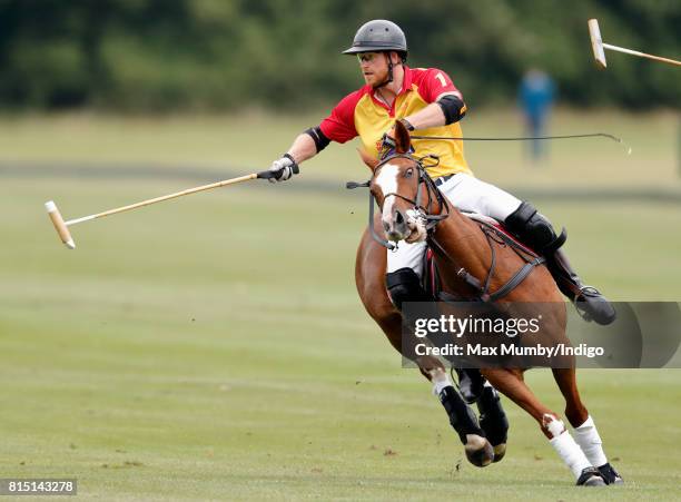 Prince Harry plays in the Jerudong Park Trophy charity polo match at Cirencester Park Polo Club on July 15, 2017 in Cirencester, England.