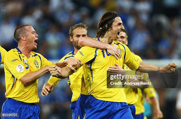 Zlatan Ibrahimovic of Sweden celebrates with team mates Daniel Andersson scoring the opening goal during the UEFA EURO 2008 Group D match between...
